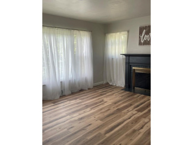 NEWLY UPDATED WITH LOADS OF CHARM AND CLOSE TO ALL AMENITIES on Bluefield Elks Club in West Virginia - for sale on GolfHomes.com, golf home, golf lot