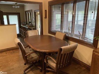 Nestled in a quiet, wooded neighborhood between Sunnyside Park & on Burlington Golf Club in Iowa - for sale on GolfHomes.com, golf home, golf lot