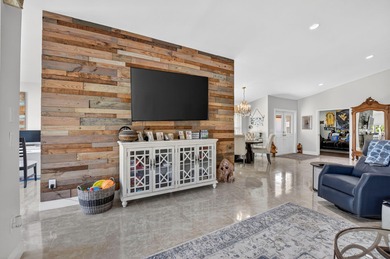 This beautifully renovated and meticulous 3BR/3BA pool home with on  in Florida - for sale on GolfHomes.com, golf home, golf lot