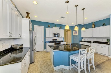 Prepare to be impressed by this beautifully upgraded one-owner on Sarasota National Golf Club in Florida - for sale on GolfHomes.com, golf home, golf lot