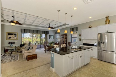 Prepare to be impressed by this beautifully upgraded one-owner on Sarasota National Golf Club in Florida - for sale on GolfHomes.com, golf home, golf lot