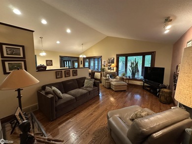 Nestled in a quiet, wooded neighborhood between Sunnyside Park & on Burlington Golf Club in Iowa - for sale on GolfHomes.com, golf home, golf lot