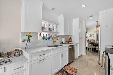 This beautifully renovated and meticulous 3BR/3BA pool home with on  in Florida - for sale on GolfHomes.com, golf home, golf lot