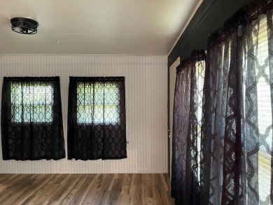 NEWLY UPDATED WITH LOADS OF CHARM AND CLOSE TO ALL AMENITIES on Bluefield Elks Club in West Virginia - for sale on GolfHomes.com, golf home, golf lot