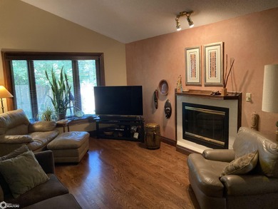 Nestled in a quiet, wooded neighborhood between Sunnyside Park & on Burlington Golf Club in Iowa - for sale on GolfHomes.com, golf home, golf lot