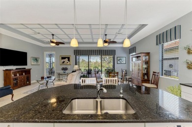 Prepare to be impressed by this beautifully upgraded one-owner on Sarasota National Golf Club in Florida - for sale on GolfHomes.com, golf home, golf lot