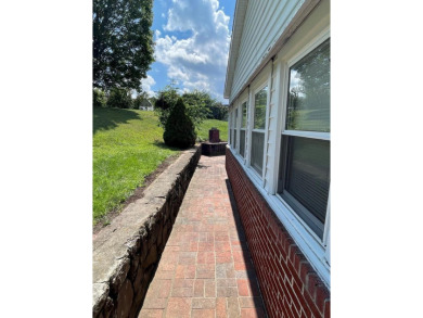 NEWLY UPDATED WITH LOADS OF CHARM AND CLOSE TO ALL AMENITIES on Bluefield Elks Club in West Virginia - for sale on GolfHomes.com, golf home, golf lot