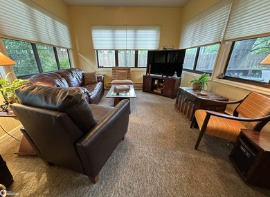 Nestled in a quiet, wooded neighborhood between Sunnyside Park & on Burlington Golf Club in Iowa - for sale on GolfHomes.com, golf home, golf lot