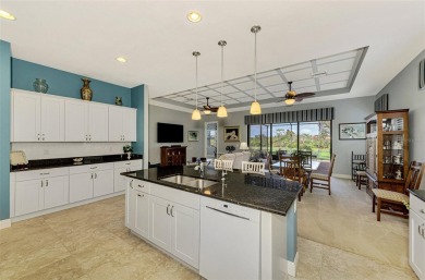 Prepare to be impressed by this beautifully upgraded one-owner on Sarasota National Golf Club in Florida - for sale on GolfHomes.com, golf home, golf lot