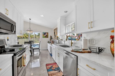 This beautifully renovated and meticulous 3BR/3BA pool home with on  in Florida - for sale on GolfHomes.com, golf home, golf lot