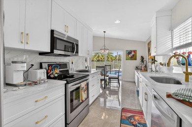 This beautifully renovated and meticulous 3BR/3BA pool home with on  in Florida - for sale on GolfHomes.com, golf home, golf lot