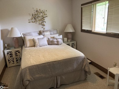 Nestled in a quiet, wooded neighborhood between Sunnyside Park & on Burlington Golf Club in Iowa - for sale on GolfHomes.com, golf home, golf lot