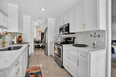 This beautifully renovated and meticulous 3BR/3BA pool home with on  in Florida - for sale on GolfHomes.com, golf home, golf lot