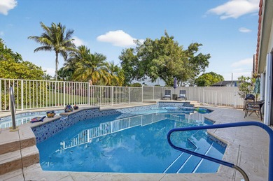 This beautifully renovated and meticulous 3BR/3BA pool home with on  in Florida - for sale on GolfHomes.com, golf home, golf lot