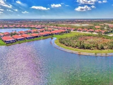 Prepare to be impressed by this beautifully upgraded one-owner on Sarasota National Golf Club in Florida - for sale on GolfHomes.com, golf home, golf lot