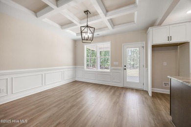 Discover your dream home where elegance meets functionality in a on Deercroft Golf and Country Club in North Carolina - for sale on GolfHomes.com, golf home, golf lot