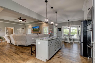 This elegant ranch on a basement offers refined main-level on Winchester Country Club, Inc. in Kentucky - for sale on GolfHomes.com, golf home, golf lot