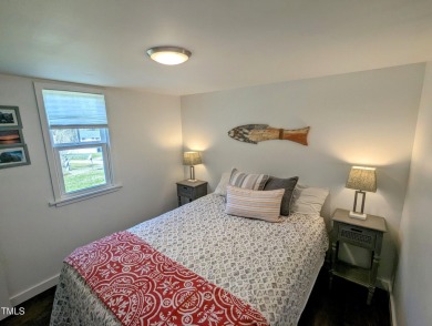 This lake view home is the perfect introduction to Kerr Lake on Kerr Lake Country Club in North Carolina - for sale on GolfHomes.com, golf home, golf lot