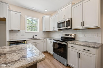 Discover your dream home where elegance meets functionality in a on Deercroft Golf and Country Club in North Carolina - for sale on GolfHomes.com, golf home, golf lot