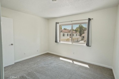 Welcome to this beautifully maintained townhome located in the on Vista Valencia Golf Course in California - for sale on GolfHomes.com, golf home, golf lot