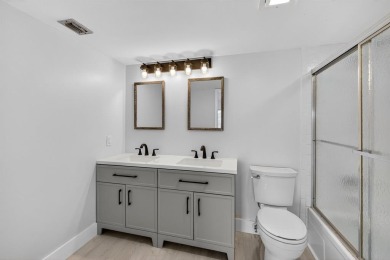 Presenting Victoria's Beauty - Your Move-In Ready Paradise! Step on Wynmoor Golf Course in Florida - for sale on GolfHomes.com, golf home, golf lot