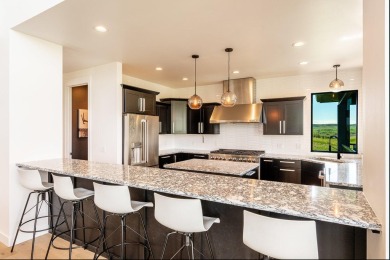 This breathtaking contemporary home offers the perfect blend of on The Powder Horn Golf Club - Mountain in Wyoming - for sale on GolfHomes.com, golf home, golf lot