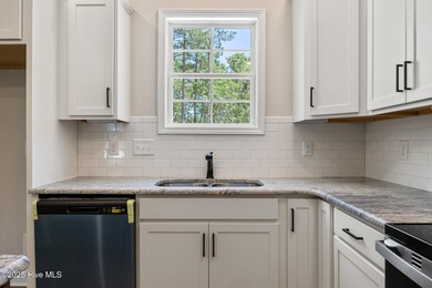 Discover your dream home where elegance meets functionality in a on Deercroft Golf and Country Club in North Carolina - for sale on GolfHomes.com, golf home, golf lot