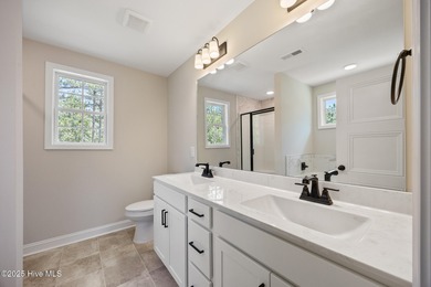 Discover your dream home where elegance meets functionality in a on Deercroft Golf and Country Club in North Carolina - for sale on GolfHomes.com, golf home, golf lot