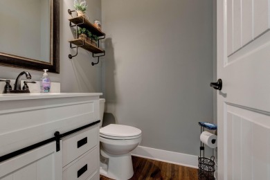 This elegant ranch on a basement offers refined main-level on Winchester Country Club, Inc. in Kentucky - for sale on GolfHomes.com, golf home, golf lot