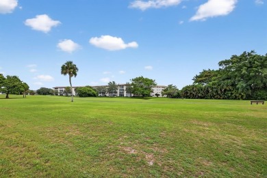 Presenting Victoria's Beauty - Your Move-In Ready Paradise! Step on Wynmoor Golf Course in Florida - for sale on GolfHomes.com, golf home, golf lot