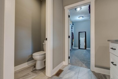 This elegant ranch on a basement offers refined main-level on Winchester Country Club, Inc. in Kentucky - for sale on GolfHomes.com, golf home, golf lot