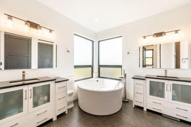 This breathtaking contemporary home offers the perfect blend of on The Powder Horn Golf Club - Mountain in Wyoming - for sale on GolfHomes.com, golf home, golf lot