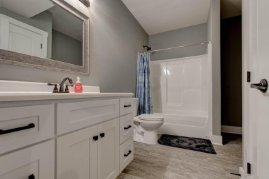 This elegant ranch on a basement offers refined main-level on Winchester Country Club, Inc. in Kentucky - for sale on GolfHomes.com, golf home, golf lot