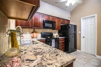 Southside Move In Ready!! 3BR/2Bath split plan with almost 1,500 on Cleveland Heights Golf Course in Florida - for sale on GolfHomes.com, golf home, golf lot