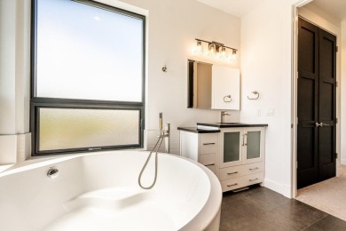 This breathtaking contemporary home offers the perfect blend of on The Powder Horn Golf Club - Mountain in Wyoming - for sale on GolfHomes.com, golf home, golf lot