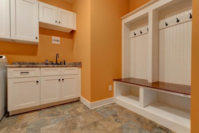 This elegant ranch on a basement offers refined main-level on Winchester Country Club, Inc. in Kentucky - for sale on GolfHomes.com, golf home, golf lot
