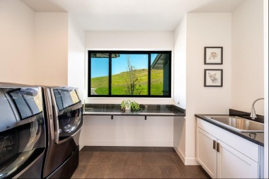 This breathtaking contemporary home offers the perfect blend of on The Powder Horn Golf Club - Mountain in Wyoming - for sale on GolfHomes.com, golf home, golf lot