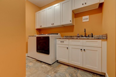 This elegant ranch on a basement offers refined main-level on Winchester Country Club, Inc. in Kentucky - for sale on GolfHomes.com, golf home, golf lot