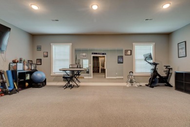 This elegant ranch on a basement offers refined main-level on Winchester Country Club, Inc. in Kentucky - for sale on GolfHomes.com, golf home, golf lot