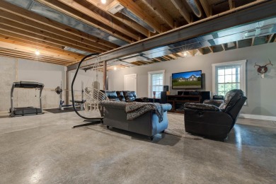 This elegant ranch on a basement offers refined main-level on Winchester Country Club, Inc. in Kentucky - for sale on GolfHomes.com, golf home, golf lot