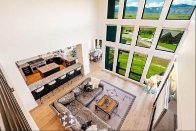 This breathtaking contemporary home offers the perfect blend of on The Powder Horn Golf Club - Mountain in Wyoming - for sale on GolfHomes.com, golf home, golf lot