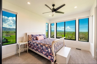 This breathtaking contemporary home offers the perfect blend of on The Powder Horn Golf Club - Mountain in Wyoming - for sale on GolfHomes.com, golf home, golf lot