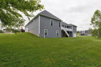 This elegant ranch on a basement offers refined main-level on Winchester Country Club, Inc. in Kentucky - for sale on GolfHomes.com, golf home, golf lot