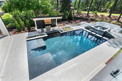 Experience the pinnacle of modern luxury living crafted by on North Ridge Country Club in North Carolina - for sale on GolfHomes.com, golf home, golf lot