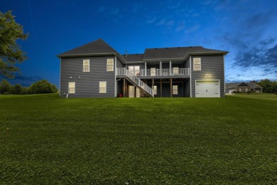 This elegant ranch on a basement offers refined main-level on Winchester Country Club, Inc. in Kentucky - for sale on GolfHomes.com, golf home, golf lot