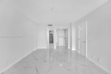 Experience luxury in this remodeled 2-bedroom, 2-bath apartment on Turnberry Isle Resort and Club in Florida - for sale on GolfHomes.com, golf home, golf lot