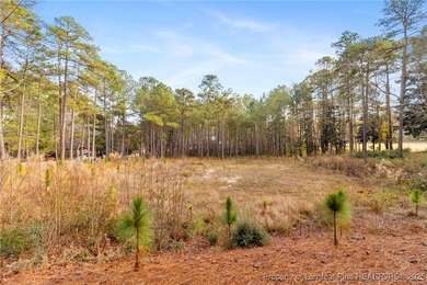 Discover the perfect setting to build your dream home in the on Pinewild Country Club of Pinehurst in North Carolina - for sale on GolfHomes.com, golf home, golf lot