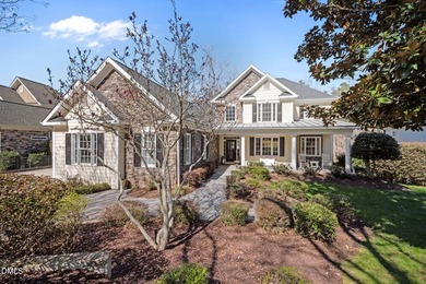 Life grows beautifully at 490 Bear Tree, where timeless elegance on The Preserve At Jordan Lake Golf Club in North Carolina - for sale on GolfHomes.com, golf home, golf lot