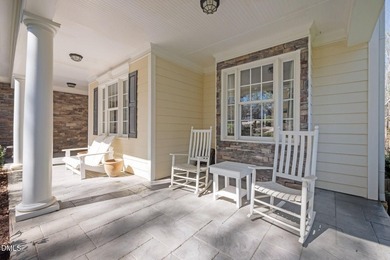 Life grows beautifully at 490 Bear Tree, where timeless elegance on The Preserve At Jordan Lake Golf Club in North Carolina - for sale on GolfHomes.com, golf home, golf lot