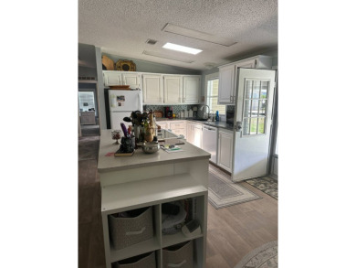 Discover Your Dream Corner Lot Home: Fully Furnished & Ready for on Schalamar Creek Golf and Country Club in Florida - for sale on GolfHomes.com, golf home, golf lot